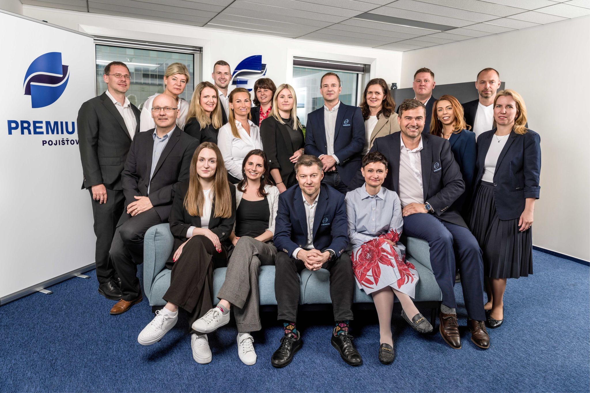 PREMIUM Insurance Company, Czech branch. The smiling and professional team of PREMIUM Insurance Company.